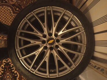 İnformatika: Chevrolet üçün yüngül lehimli disk və təkər komplekti. - Marka/loqo