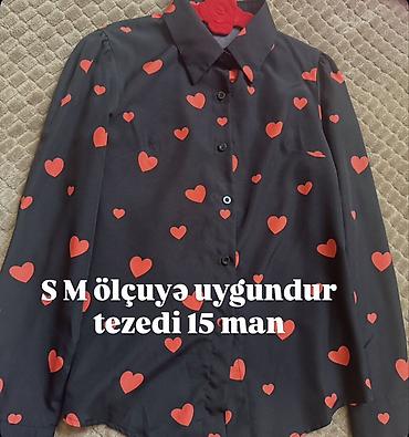 Köynək və bluzalar: Qadın köynəyi – qara fon üzərində qırmızı ürək naxışları. Uzunqol — 1