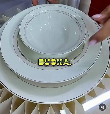 bacac diska statua: Elegantni set tanjira i činija od finog porcelana - Komplet za — 1