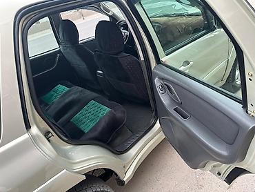 Транспорт: Mazda Tribute: 2004 г., 2.3 л, Механика, Бензин, Кроссовер — 10