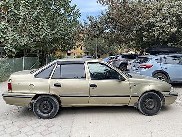 dewoo damas: Daewoo Nexia: 2006 г., Бензин, Седан — 4