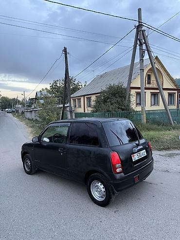 муравей с бензином: Daihatsu Cuore: 2001 г., 1 л, Механика, Бензин, Купе — 7