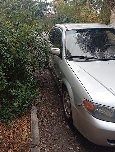Транспорт: Mazda Protege: 2003 г., 2 л, Автомат, Бензин, Универсал — 5