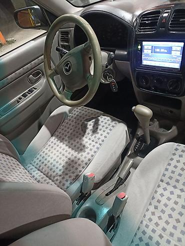 mazda 2000: Mazda Demio: 2000 г., Автомат, Универсал — 6