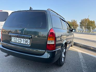 porsche satisi: Opel Astra: 1.6 l | 1999 il 440000 km Universal — 6