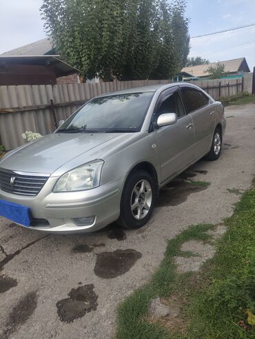 Другие автомобили: Серебристый седан Toyota Premio. Автомобиль оснащен четырьмя дверями — 9