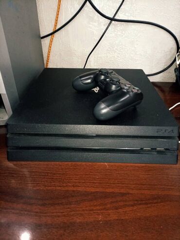 ноутбук игравой: PlayStation 4 Pro (черный) с беспроводным контроллером DualShock 4
