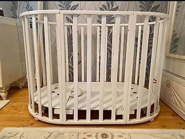 sifarişlə mebel: Oval formalı uşaq beşiyi / manez - Material: bərk ağac, ağ rəngli — 1