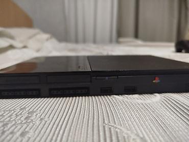 PS2 & PS1 (Sony PlayStation 2 & 1): PlayStation 2 Slim (SCPH seriyası) komplekti Paketdə: - PlayStation 2 — 7