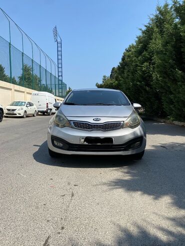 Kia Rio: 1.4 л | 2012 г. Седан