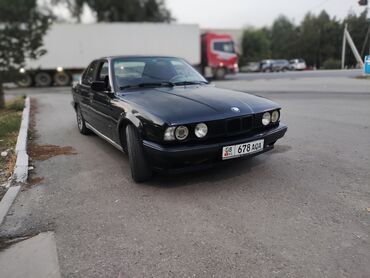 kia автомобиль: BMW 520: 1993 г., 2 л, Механика, Бензин, Седан