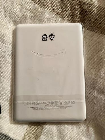 kindle paperwhite: Yenidi, populyar markadı və bir çox kitabı tapmaq mümkündür. Ciddi — 4