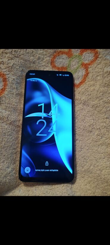 Аудиотехника: Motorola Moto G14, 128 ГБ, цвет - Белый, Кредит, Отпечаток пальца