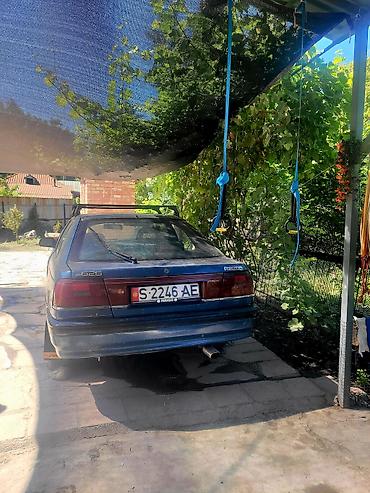 mazda 2000: Mazda 626: 1991 г., Механика, Бензин, Хэтчбэк — 6