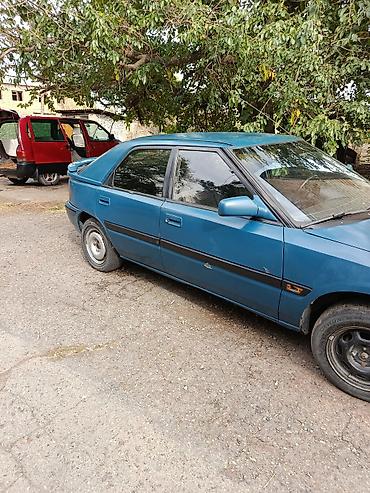 Mazda: Mazda 323: 1992 г., 1.6 л, Механика, Бензин, Хэтчбэк — 3