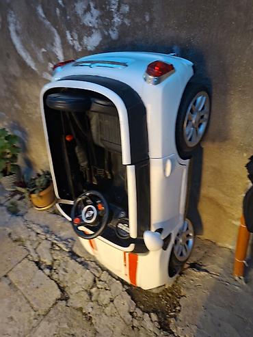 yemek masa: Uşaq üçün elektrikli minik maşını masinin rolu xarabdi zaretqa — 1