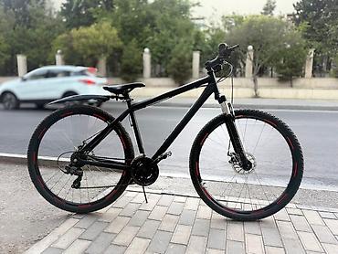 hybrid bicycle: Fars velosiped markasının qara rəngli dağ velosipedi. Velosipedin — 3