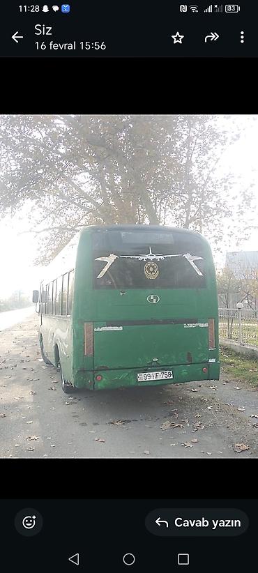 traktor farası: Yaşıl rəngli kiçik şəhər/marşrut avtobusu - Marka/model: Higer (kiçik — 7