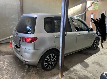 Mazda: Mazda Demio: 2004 г., 1.3 л, Автомат, Бензин, Седан