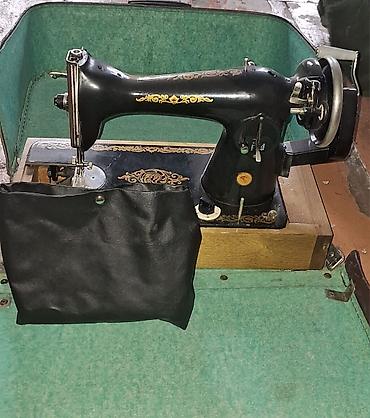 saatlar type 1: Məhsul: Mexanik tikiş maşını (köhnə model, stolüstü quruluş) Təsvir — 1
