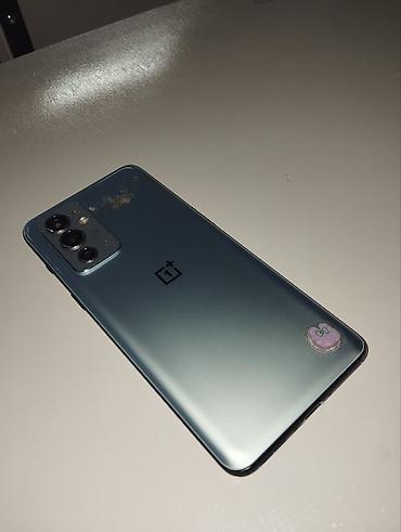 Мобильные телефоны и аксессуары: OnePlus 9RT, Б/у, 256 ГБ, цвет - Голубой, 2 SIM — 2