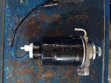 Фильтры: Топливный фильтр в сборе (Fuel Filter) - Номер(а) по корпусу: 310 / — 1