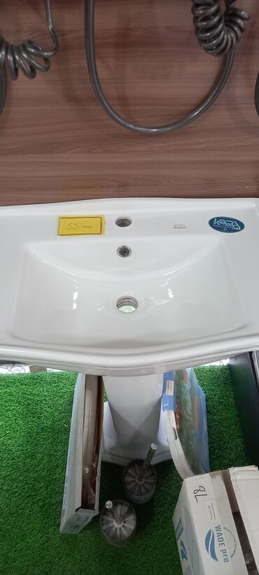 Digər tikinti materialları: Kompakt dizaynı və ağ rəngi ilə hər növ interyerə uyğunlaşan keramika
