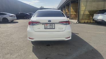 byd e5 2020: Toyota Corolla: 2021 г., 1.8 л, Вариатор, Гибрид, Седан — 4