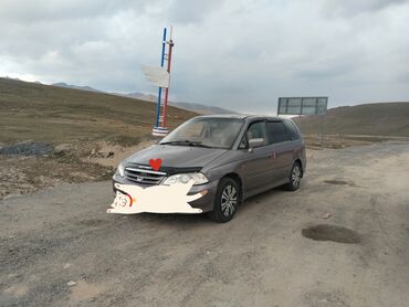 набор инструментов force: Минивэн Honda Odyssey, представленный в темно-сером цвете, является