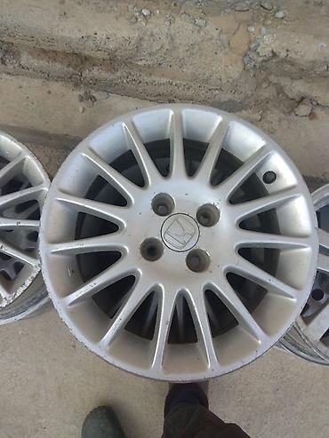 4: Литые диски Honda, оригинальные - Диаметр: 15" - Крепеж: 4 отверстия — 1