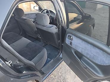 12 t: Mazda 626: 1997 г., 1.8 л, Механика, Бензин, Седан — 7