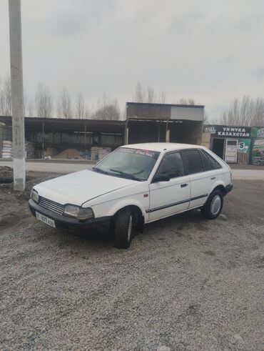 Mazda: Mazda 323: 1988 г., 1.4 л, Механика, Бензин