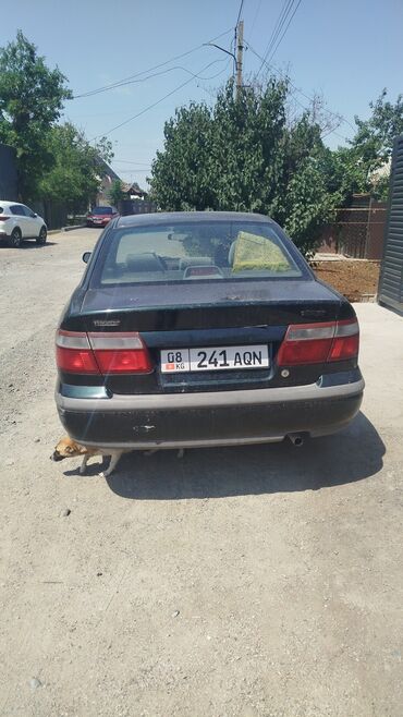 битый машина: Продаю Mazda 626 1999 г.в. темно-зеленого цвета . Мех. коробка в
