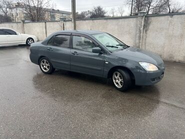 Mitsubishi: Mitsubishi Lancer: 2005 г., 1.6 л, Механика, Бензин, Седан