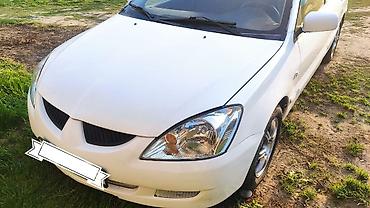 рул: Mitsubishi Lancer: 2006 г., 1.6 л, Автомат, Бензин, Седан — 5