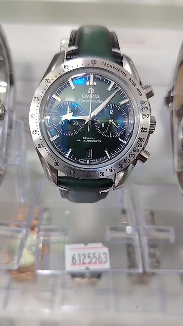 Aksesuarlar: Omega saatları – kolleksiya 1) Omega Speedmaster Professional “Snoopy — 10