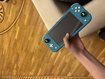 nintendo switch 3 lite: Nintendo Switch Lite – türkuaz rəngdə portativ oyun konsolu — 1