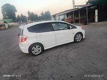 Honda Fit: 2009 г., 1.5 л, Автомат, Бензин, Хэтчбэк