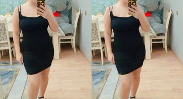elbiseler: Qara rəngli qolsuz, nazik qayışlı mini don. Sadə və klassik dizayn