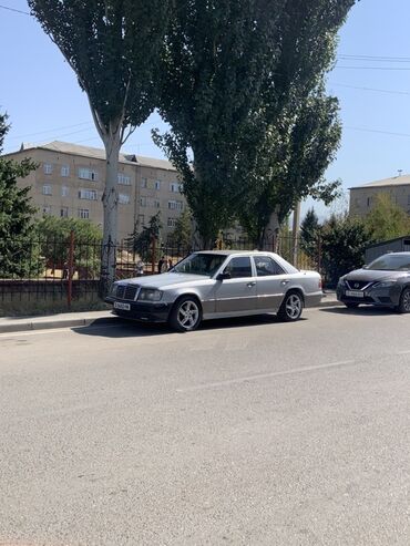 Mercedes-Benz E-Class W124, седан, серебристый цвет. Характеристики и