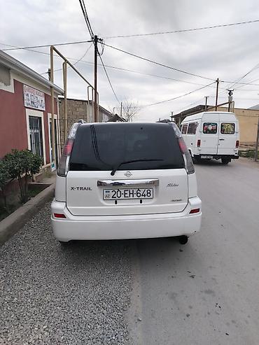 16 kalpak: Nissan X-Trail (T30) – ağ rəngli, 5 yerlik SUV Xüsusiyyətlər: - — 9
