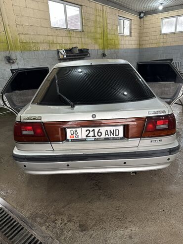 машина gets: Mazda 6: 1990 г., 2 л, Механика, Бензин, Хетчбек