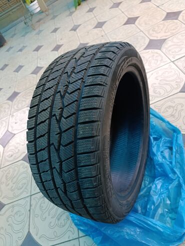 грузовые шины бу: Зимняя шина 245/45 R18 100H - Тип: зимняя (символ снежинки на