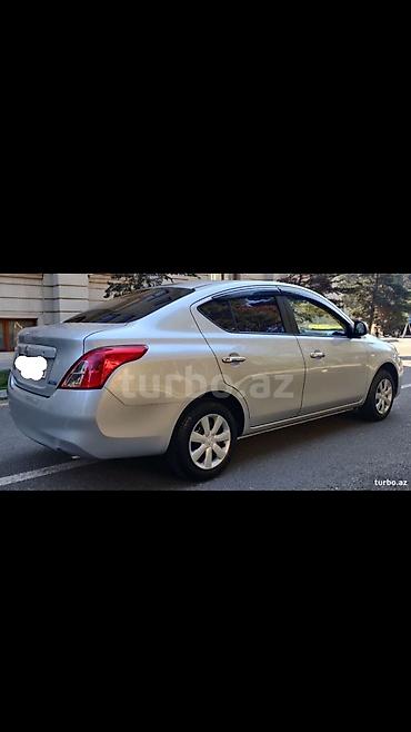tesla model s: Nissan Sunny: 1.2 l | 2012 il Sedan — 4