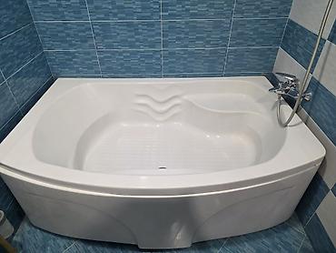 Olculeri 1.70× 0.90sm. Derinliyi 35sm Künc akril vanna – geniş və