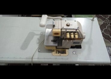 швейная машинка оверлог: Тигүүчү машина Оверлок