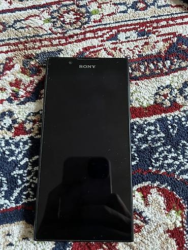 Уюлдук телефондор: Sony Xperia 1, Колдонулган, түсү - Кара, 2 SIM — 1
