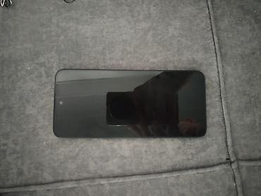 telefon gencede: Redmi 256 GB, rəng - Qara, Barmaq izi — 3