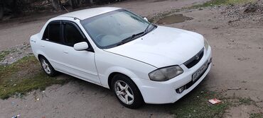 авто в россии: Mazda 323: 1999 г., 1.5 л, Автомат, Бензин, Седан