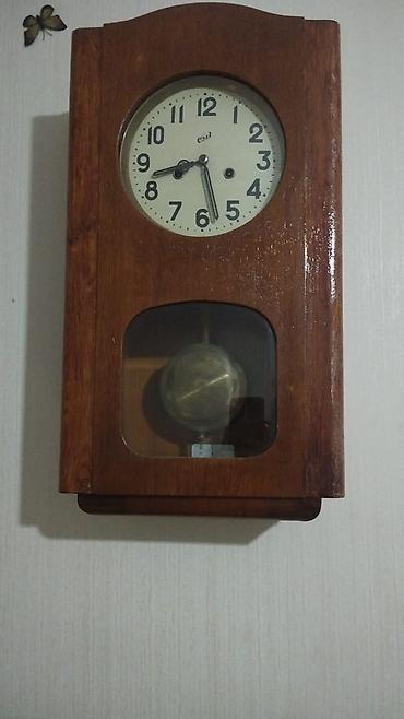 rado saat: Divar saatları, Mexaniki, Mayatnik — 1